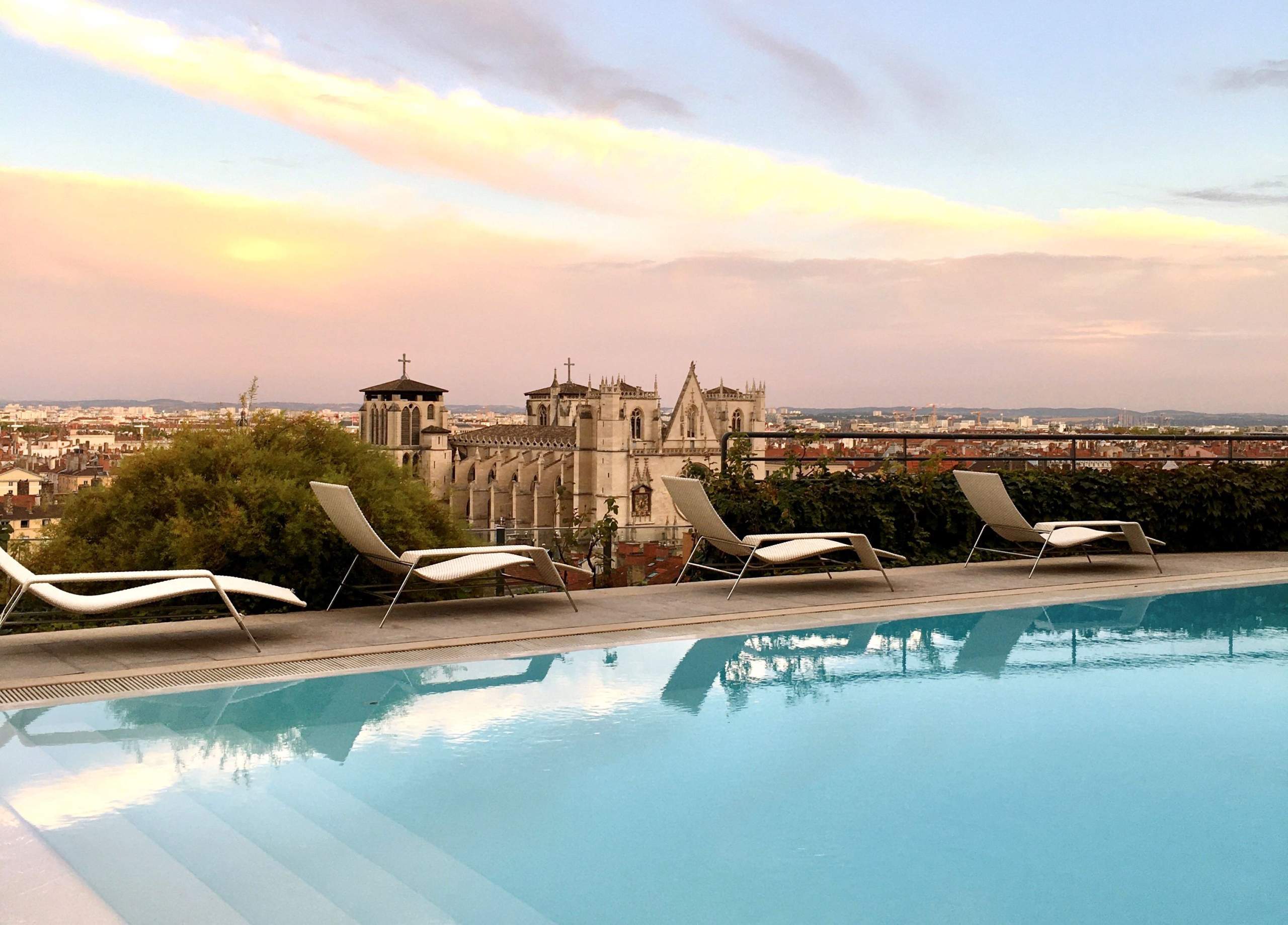Outdoor swimming pool at La Villa Florentine in Lyon